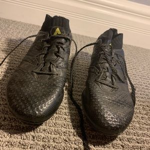 Black Adidas soccer cleats. Ace 16.1